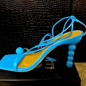 Bright blue wrap around strap heels